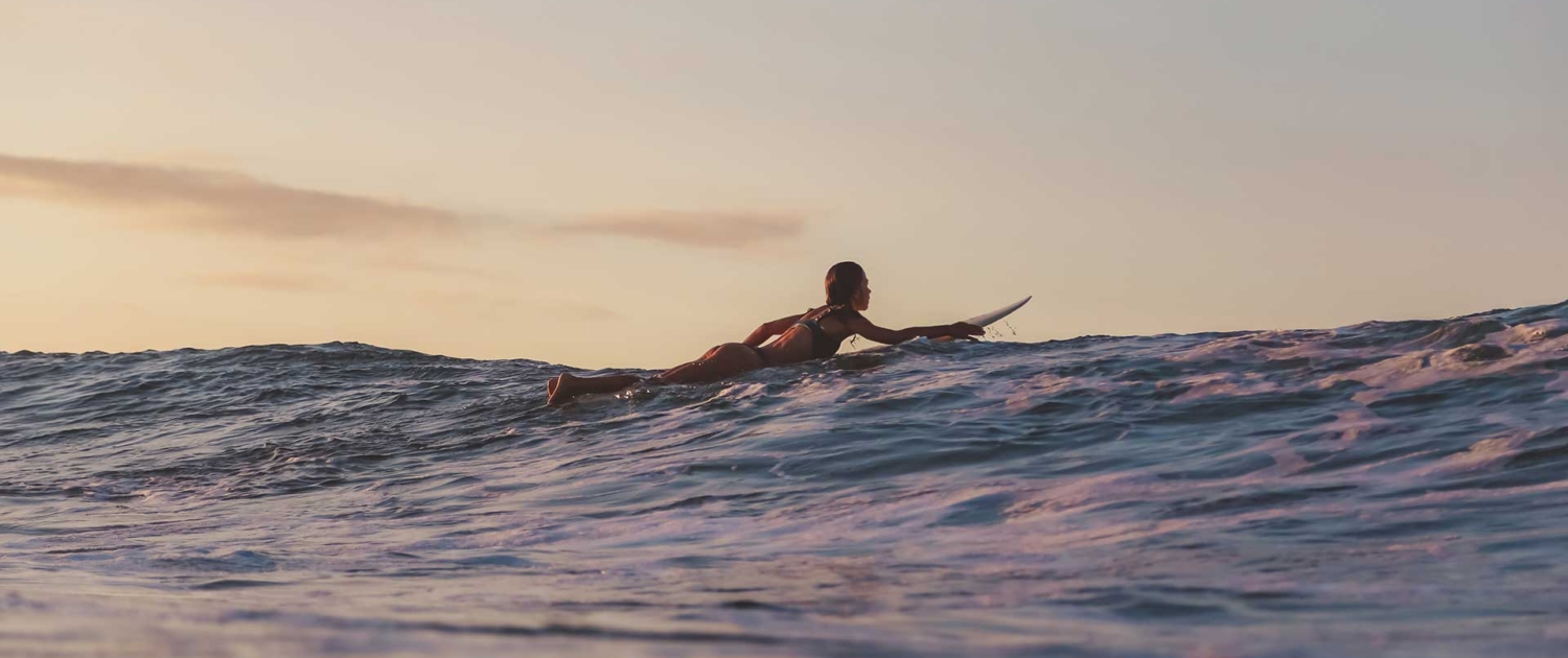 woman-on-surf-board-floating-on-water-2022-03-04-05-53-59-utc